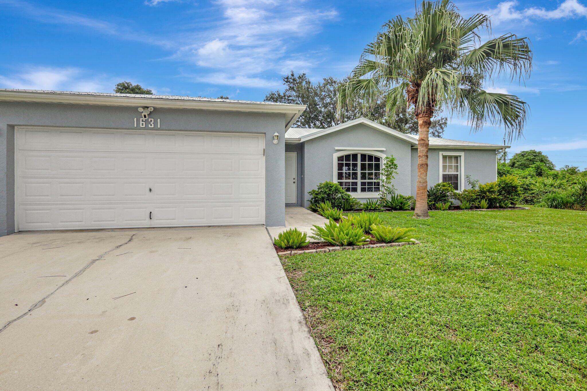 Property Photo:  1631 SW Norman Lane  FL 34984 