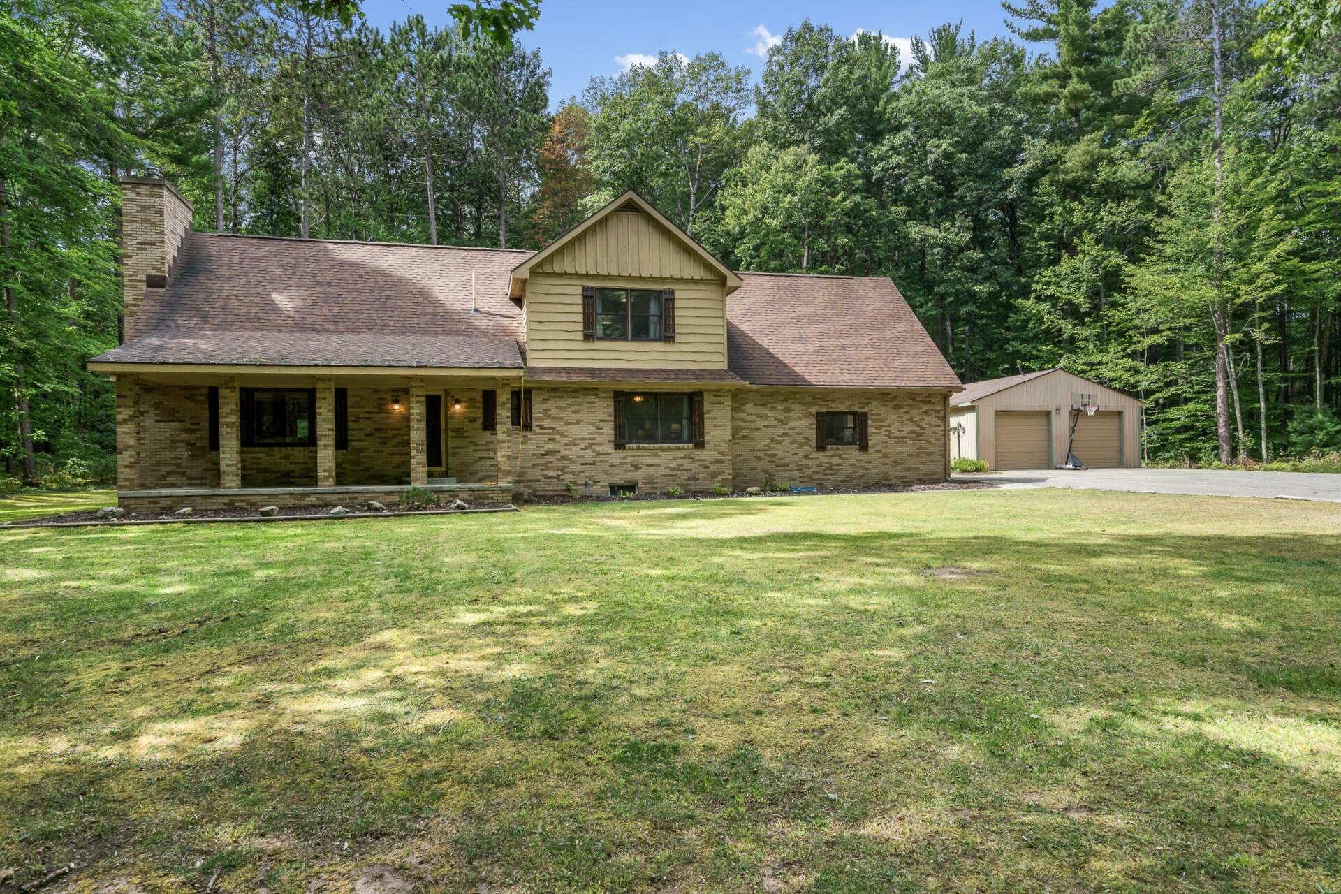 Property Photo:  410 E Indian Woods Trail  MI 49749 