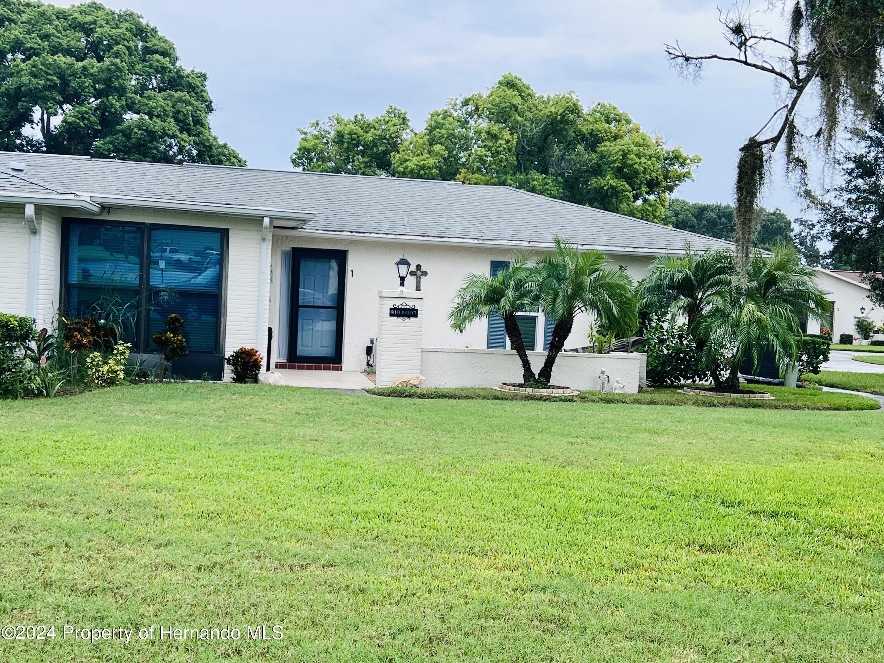 Property Photo:  8141 Bugle Court #1  FL 34668 