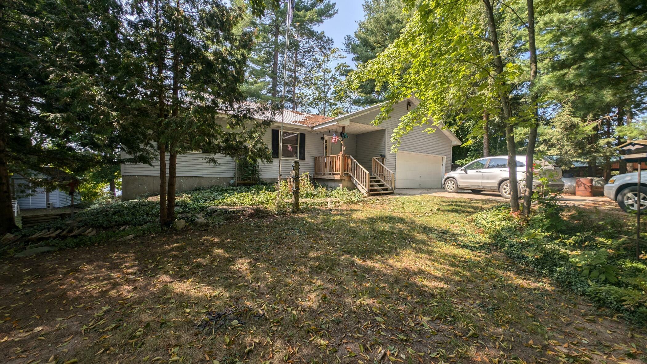 Property Photo:  8901 W Isle Park Drive  MI 49644 