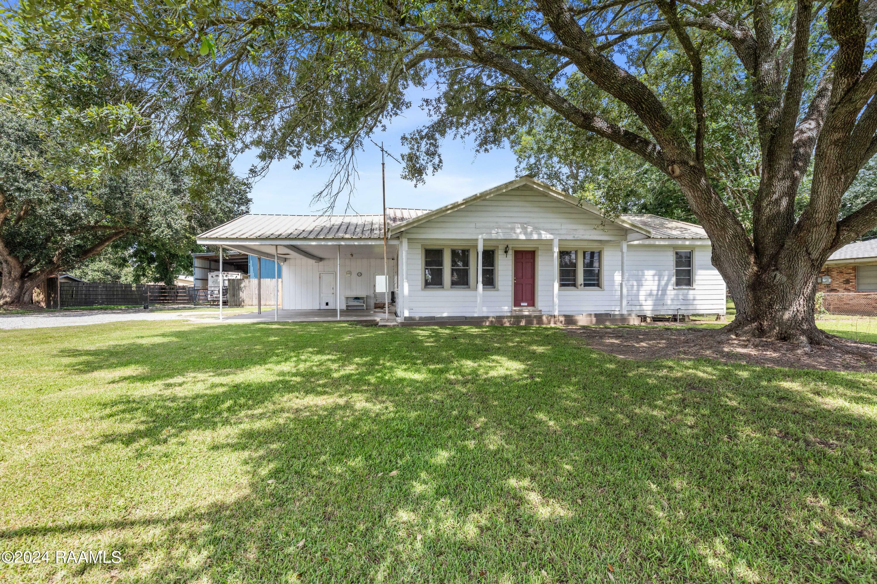 Property Photo:  129 E Broussard Road  LA 70503 