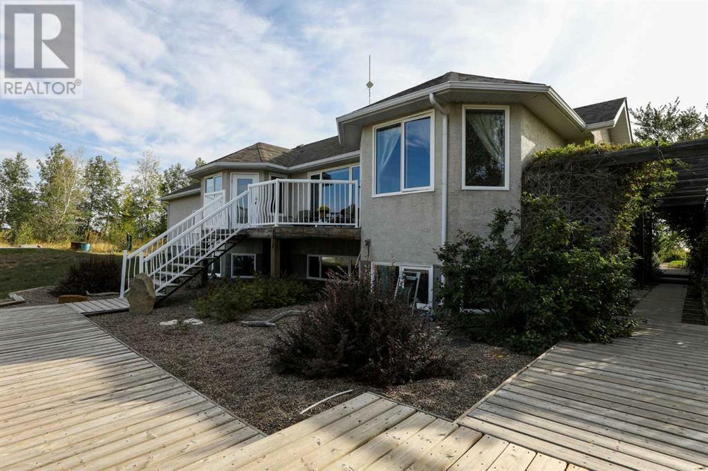 Property Photo: 103038 Rge Rd 165 AB T1G 2C6