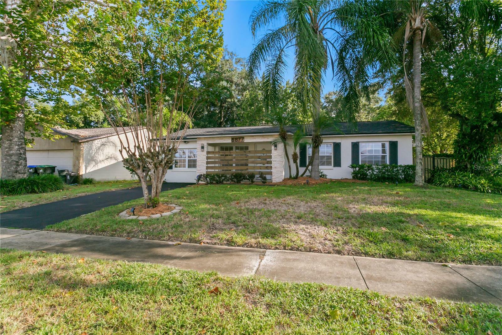 Property Photo:  6877 Firebird Drive  FL 32810 