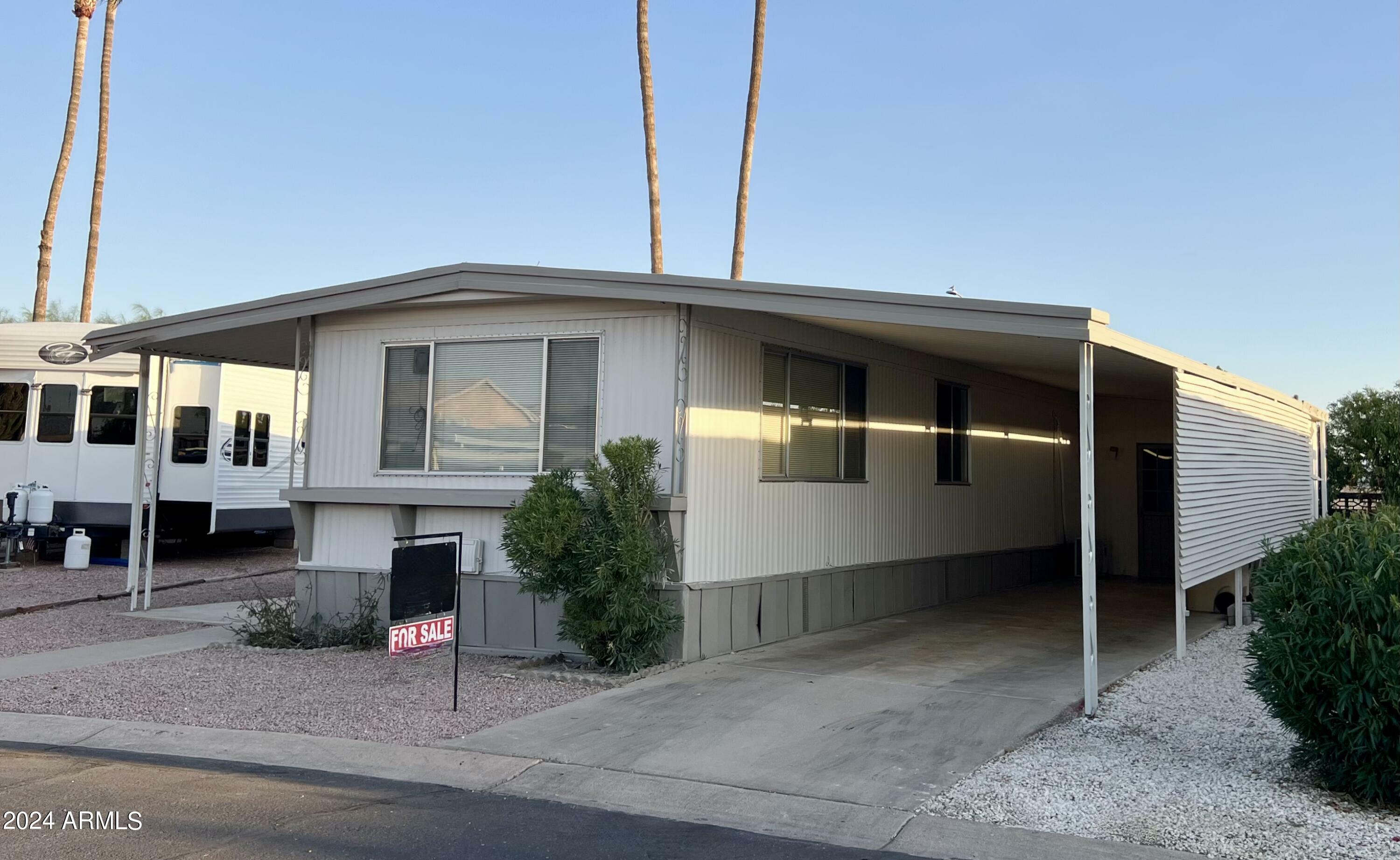 Property Photo:  11411 N 91st Avenue 217  AZ 85345 