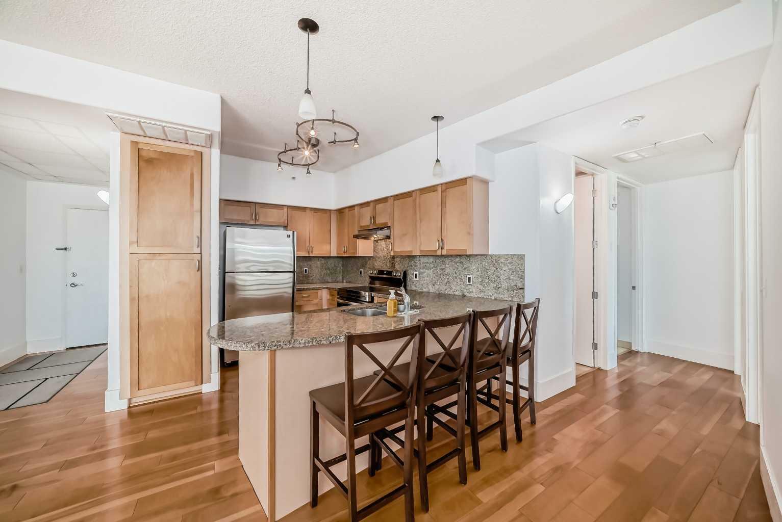 Property Photo:  205 Riverfront Avenue SW 401  AB T2P 5K4 