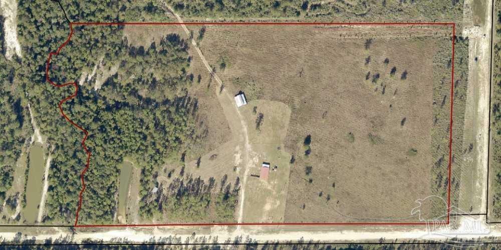 Property Photo:  7598 Walther Rd  FL 32570 