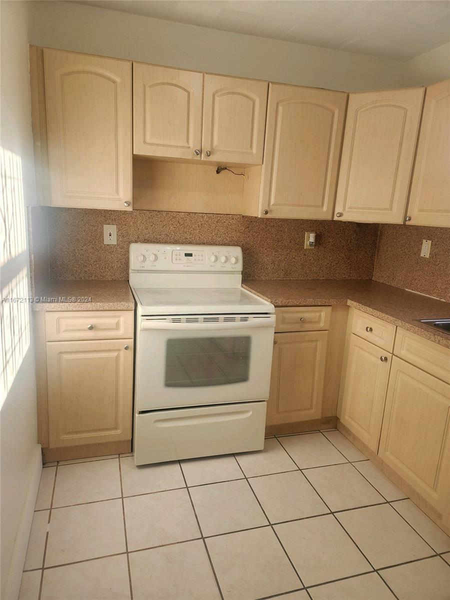 Property Photo:  1111 NW 19th Ave 105  FL 33125 