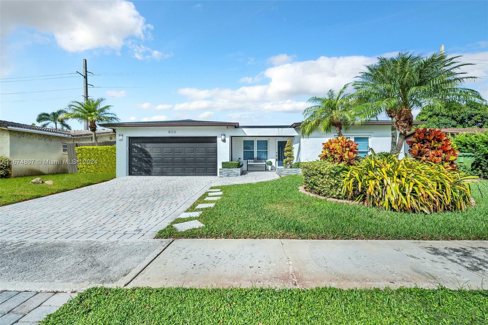 Property Photo:  800 NW 91st Ave  FL 33024 