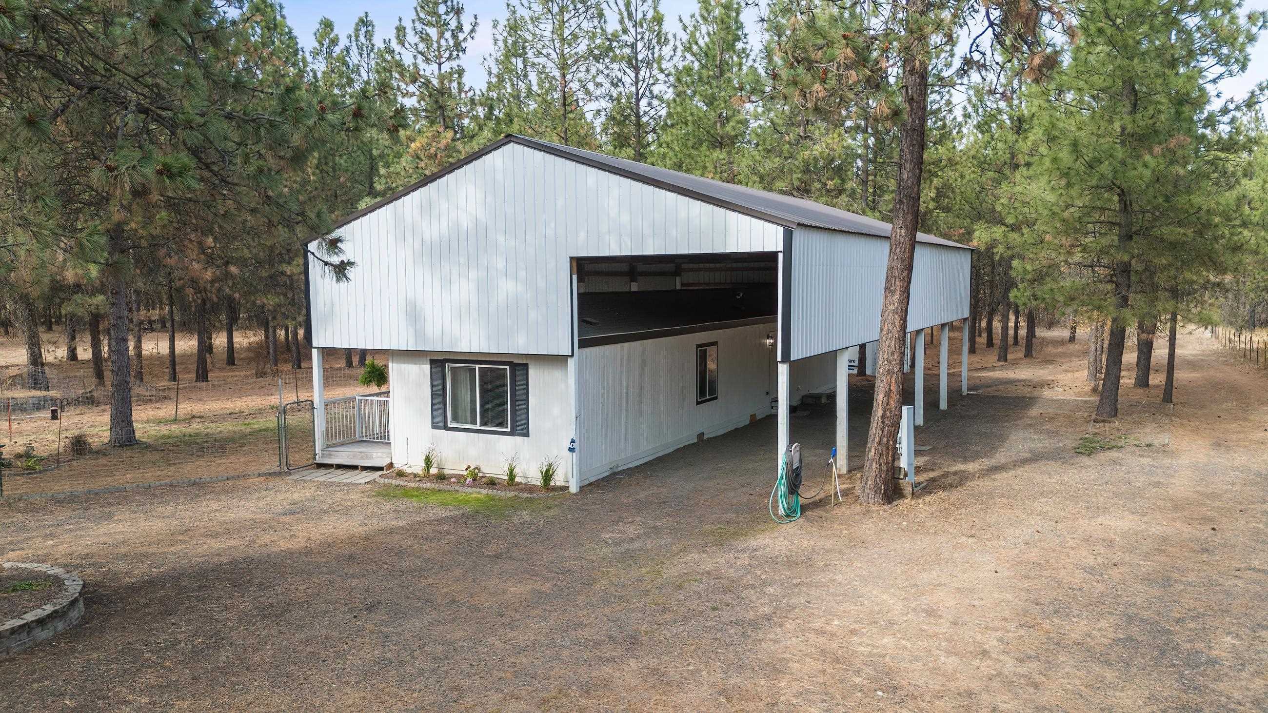 Property Photo:  8510 W White Rd  WA 99004 