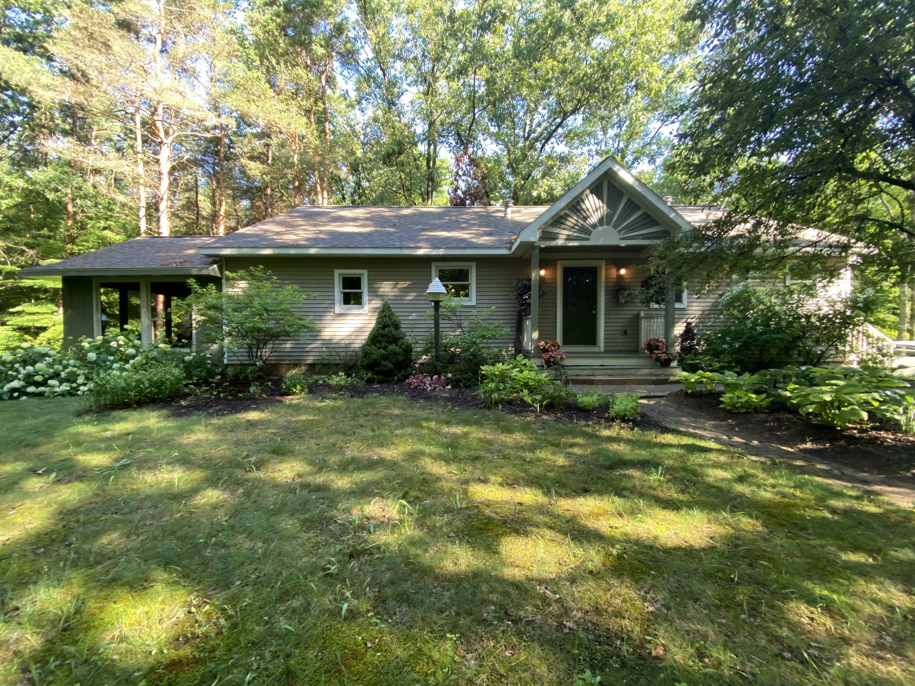 Property Photo:  10675 Connelly Avenue NE  MI 48838 