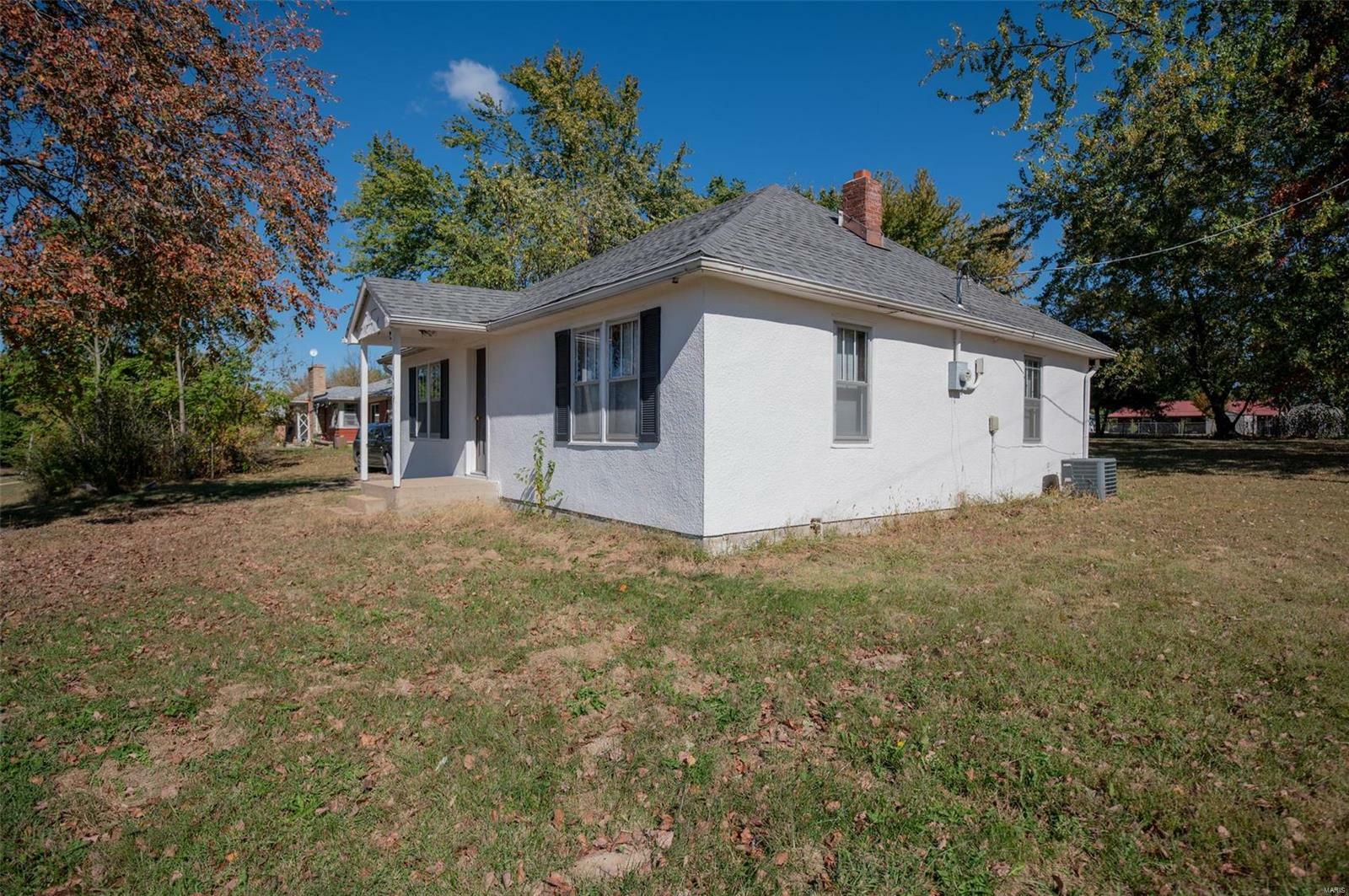 Property Photo:  404 Alvarado Avenue  MO 65013 