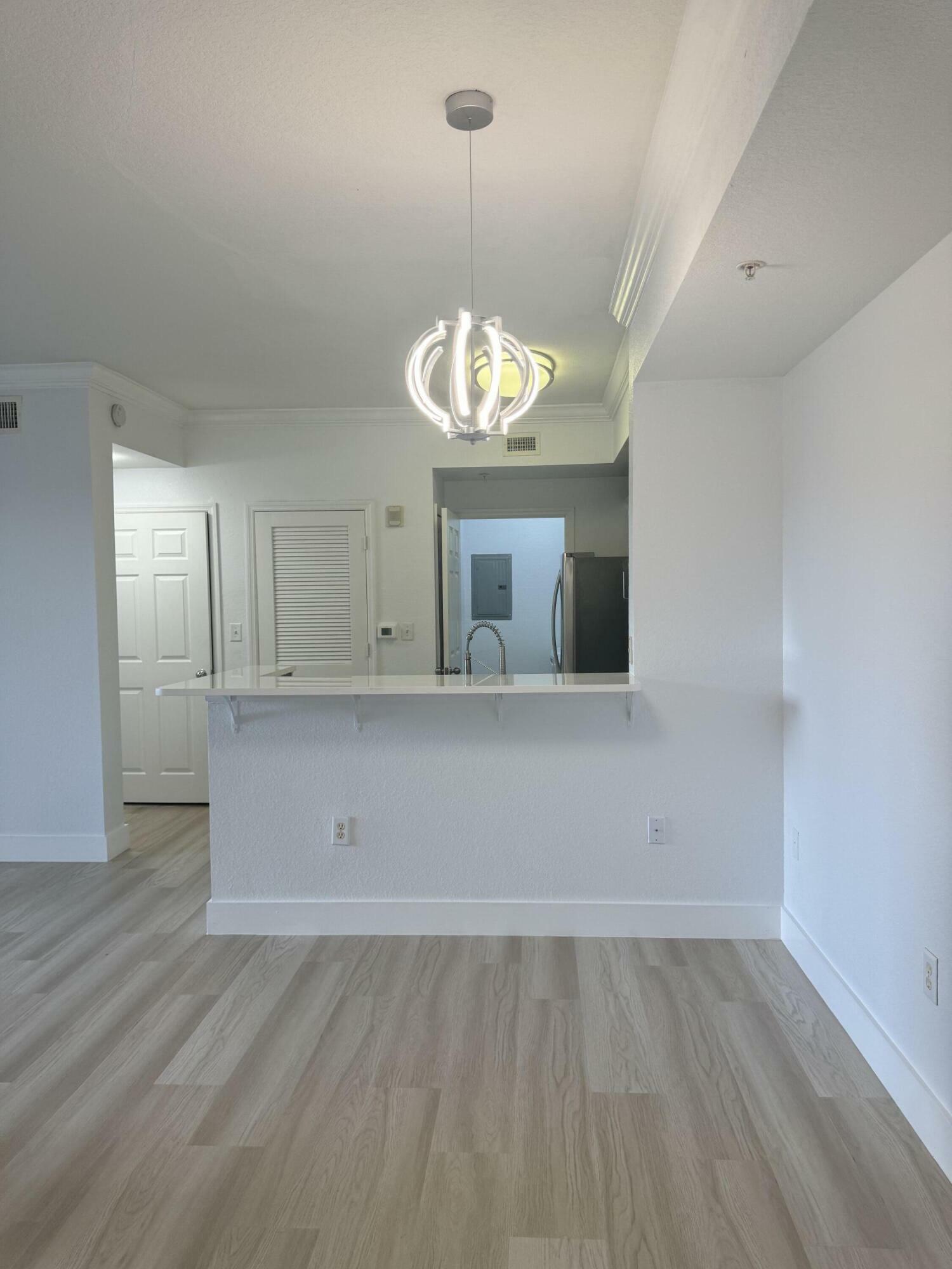 Property Photo:  15115 Michelangelo Boulevard 104  FL 33446 