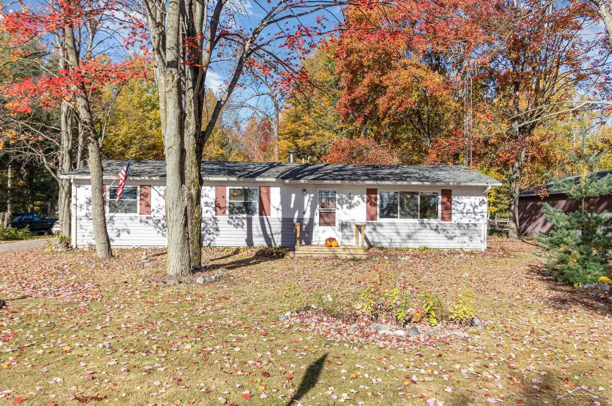 Property Photo:  4914 Wixom Drive  MI 48612 