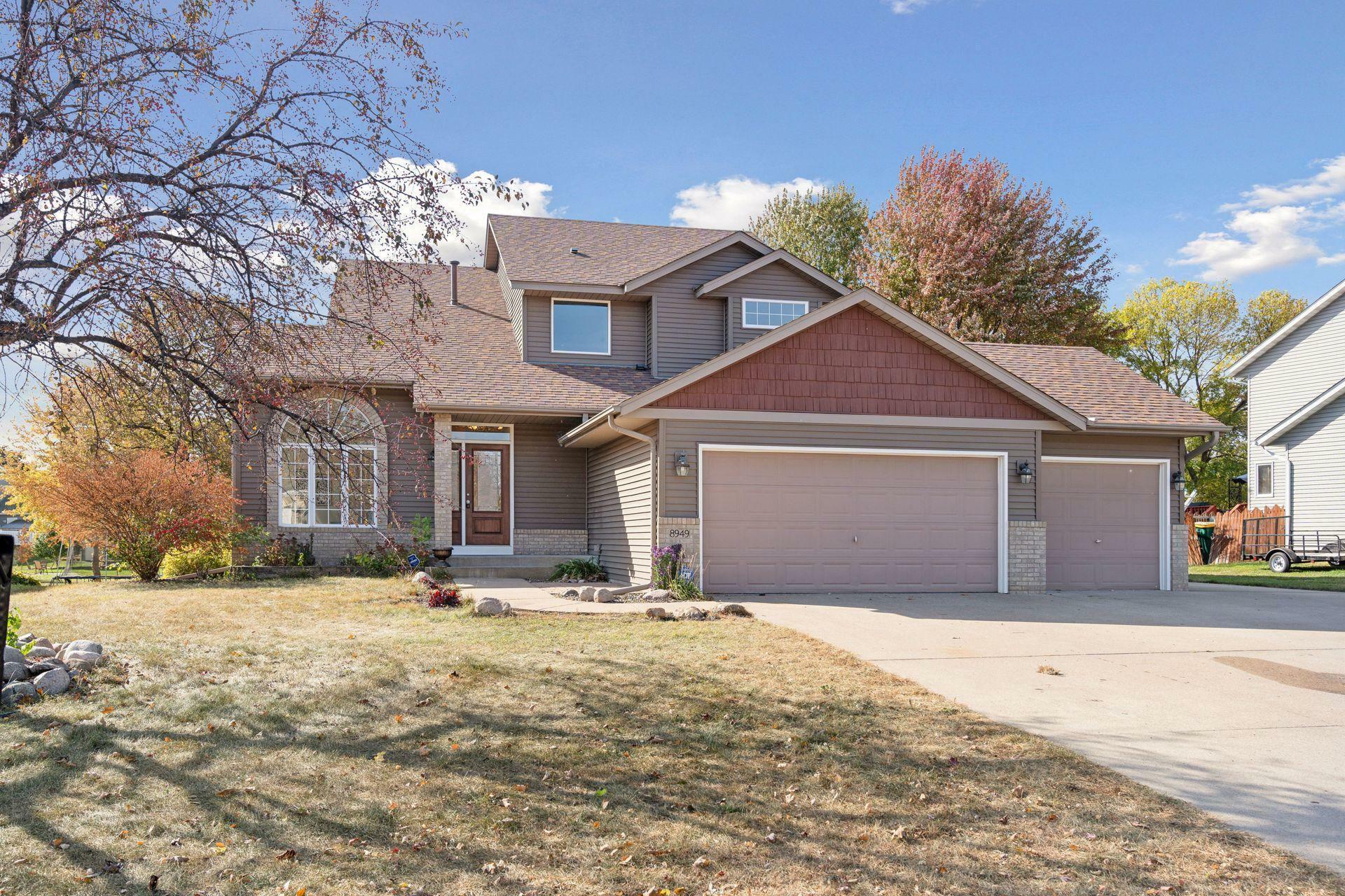 Property Photo:  8949 Trinity Gardens  MN 55443 