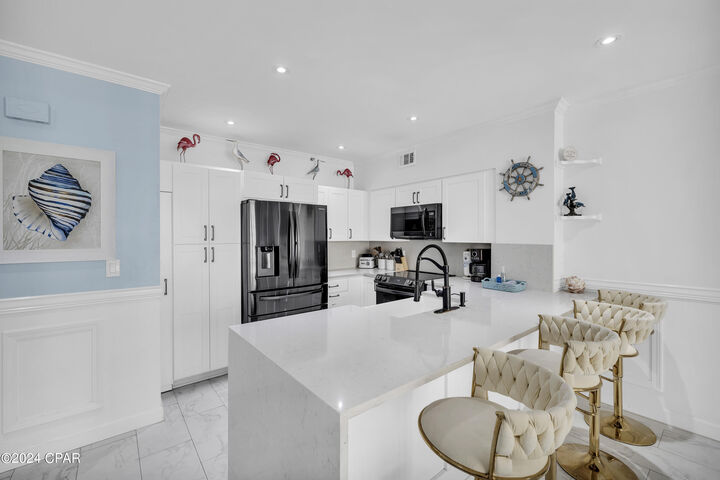 Property Photo: 9900 S Thomas Drive 1024 FL 32408