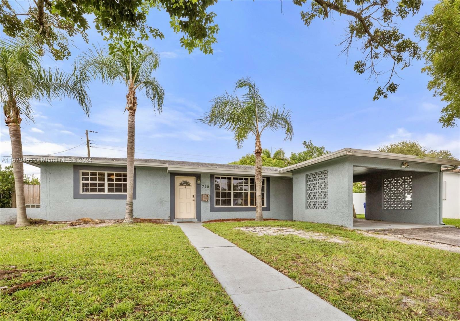 Property Photo:  720 SW 69th Way  FL 33023 