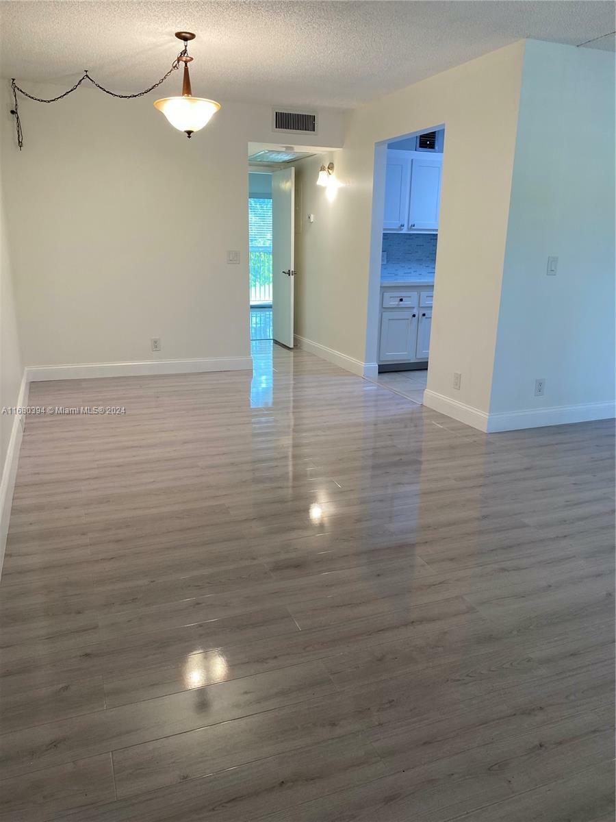 Property Photo:  801 SW 133rd Ter 203K  FL 33027 