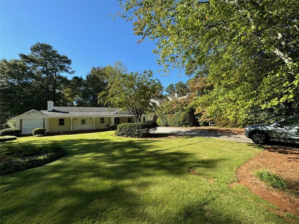 Property Photo:  4254 Peachtree Dunwoody Road NE  GA 30342 