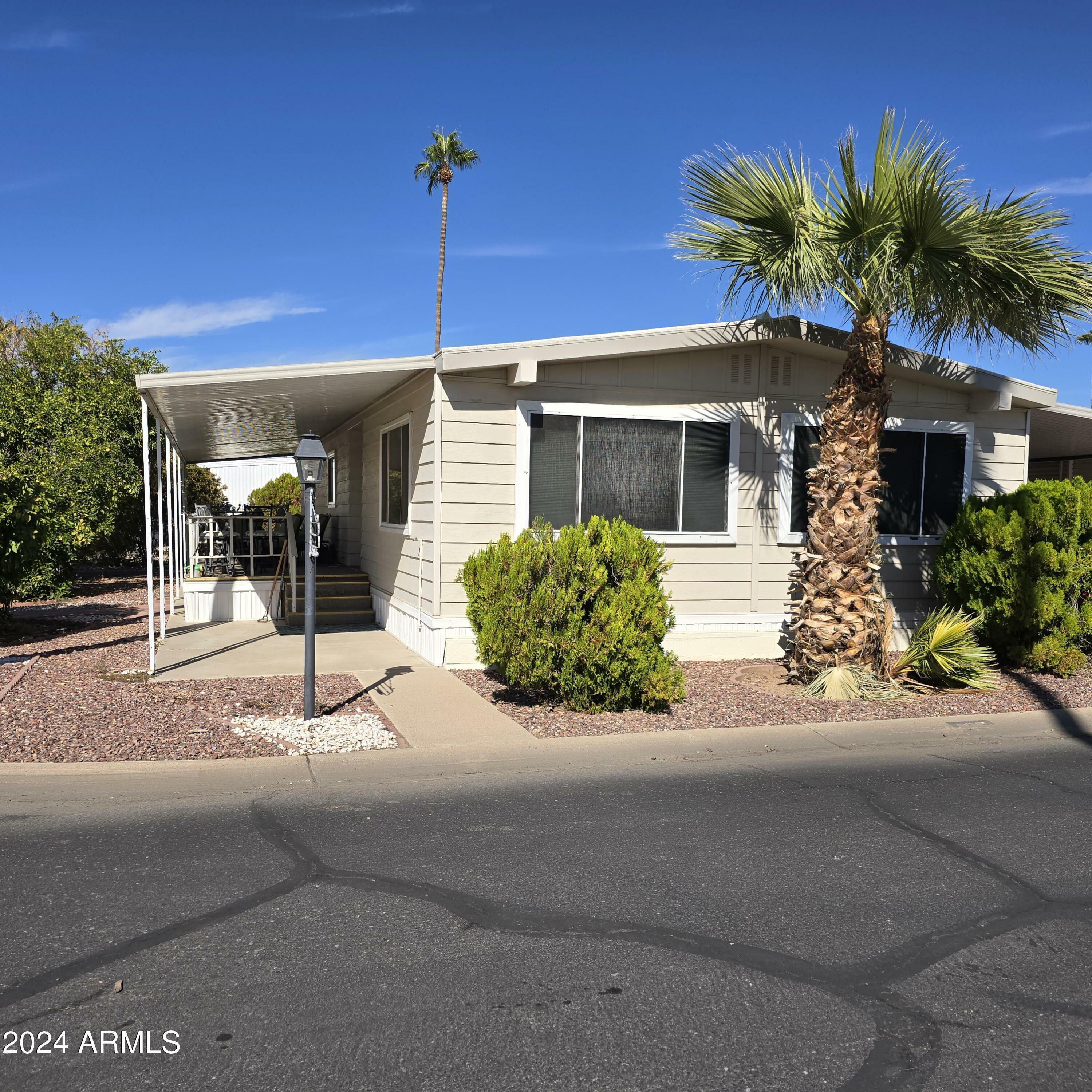 Property Photo:  11411 N 91st Avenue 185  AZ 85345 