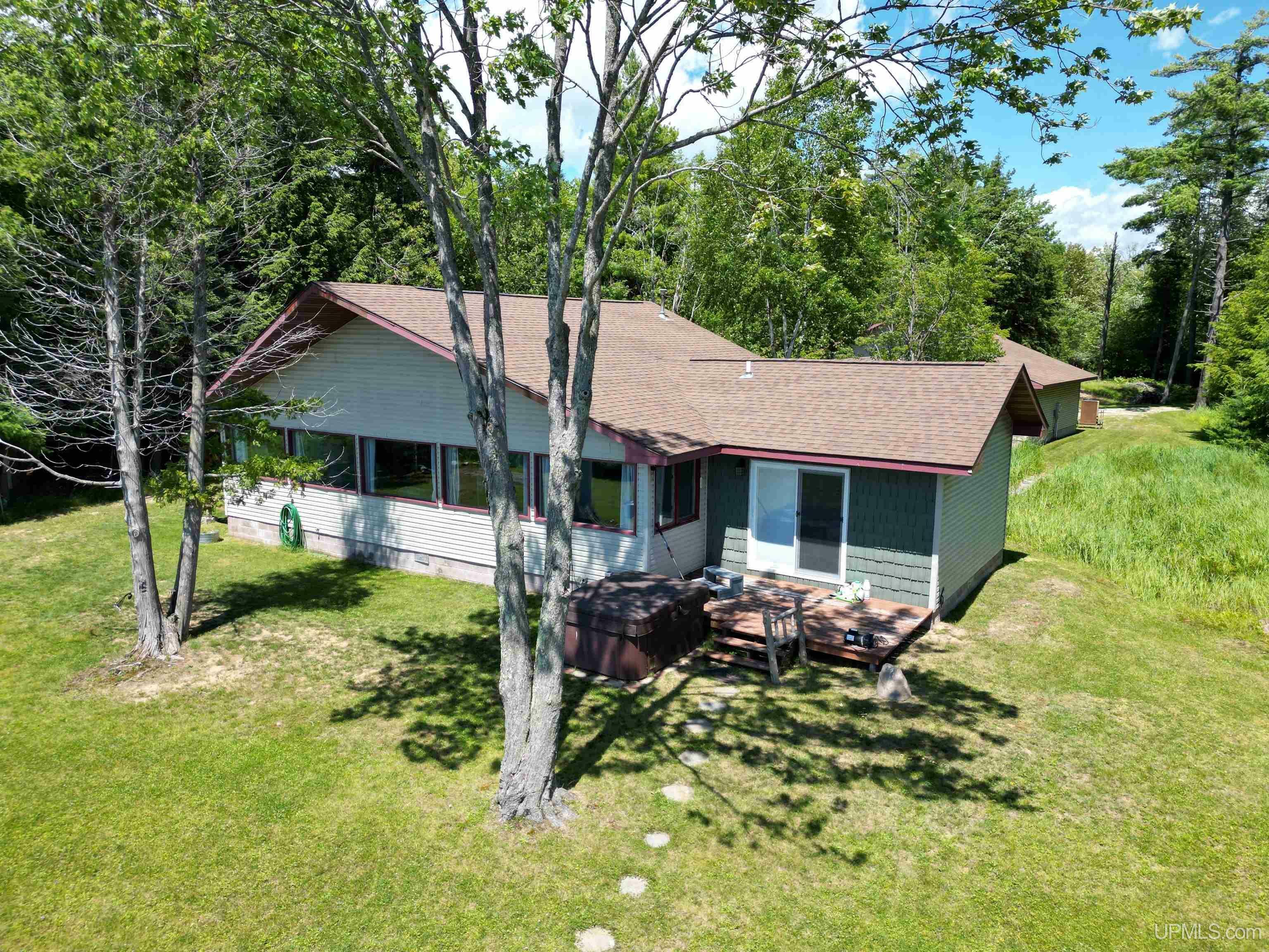 Property Photo:  1915 N Wawaushnosh Drive  MI 49854 