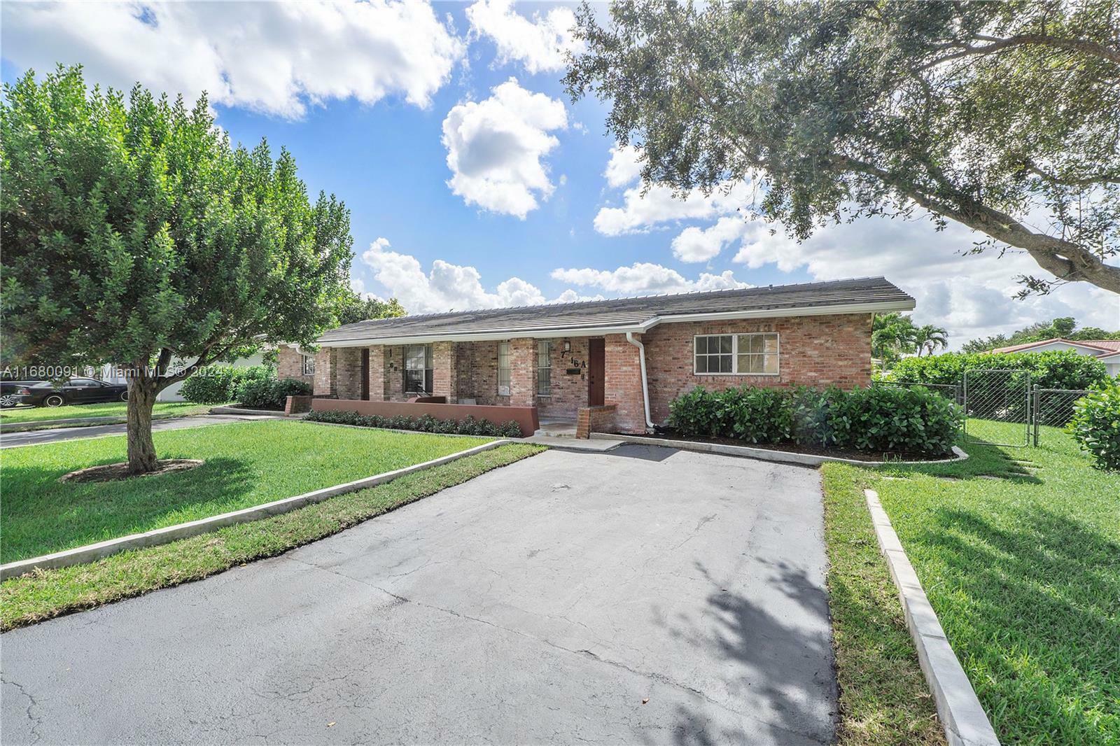 Property Photo:  7516 NW 44th Ct  FL 33065 