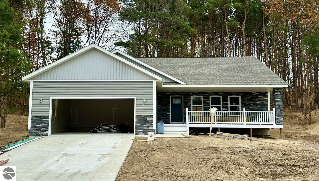 Property Photo:  1132 Farmington Drive  MI 49696 