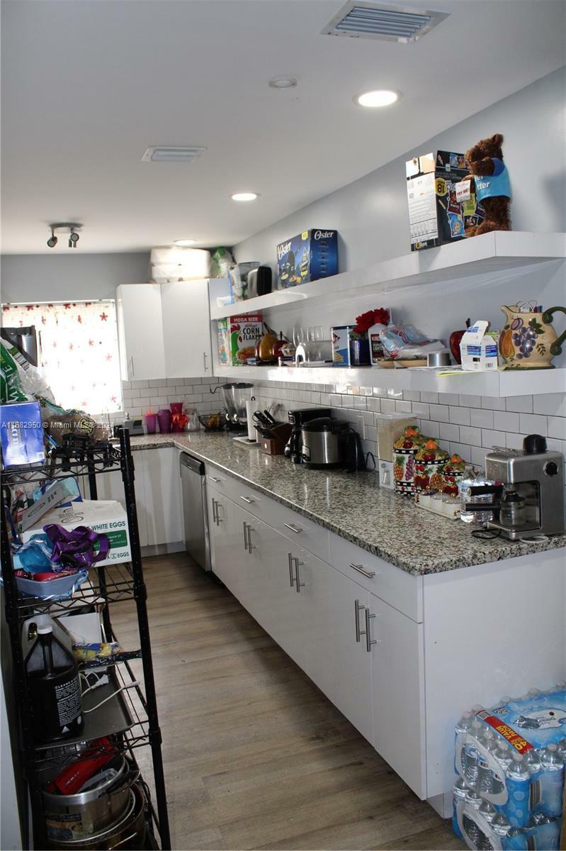 Property Photo:  1620 NW 51st St  FL 33142 