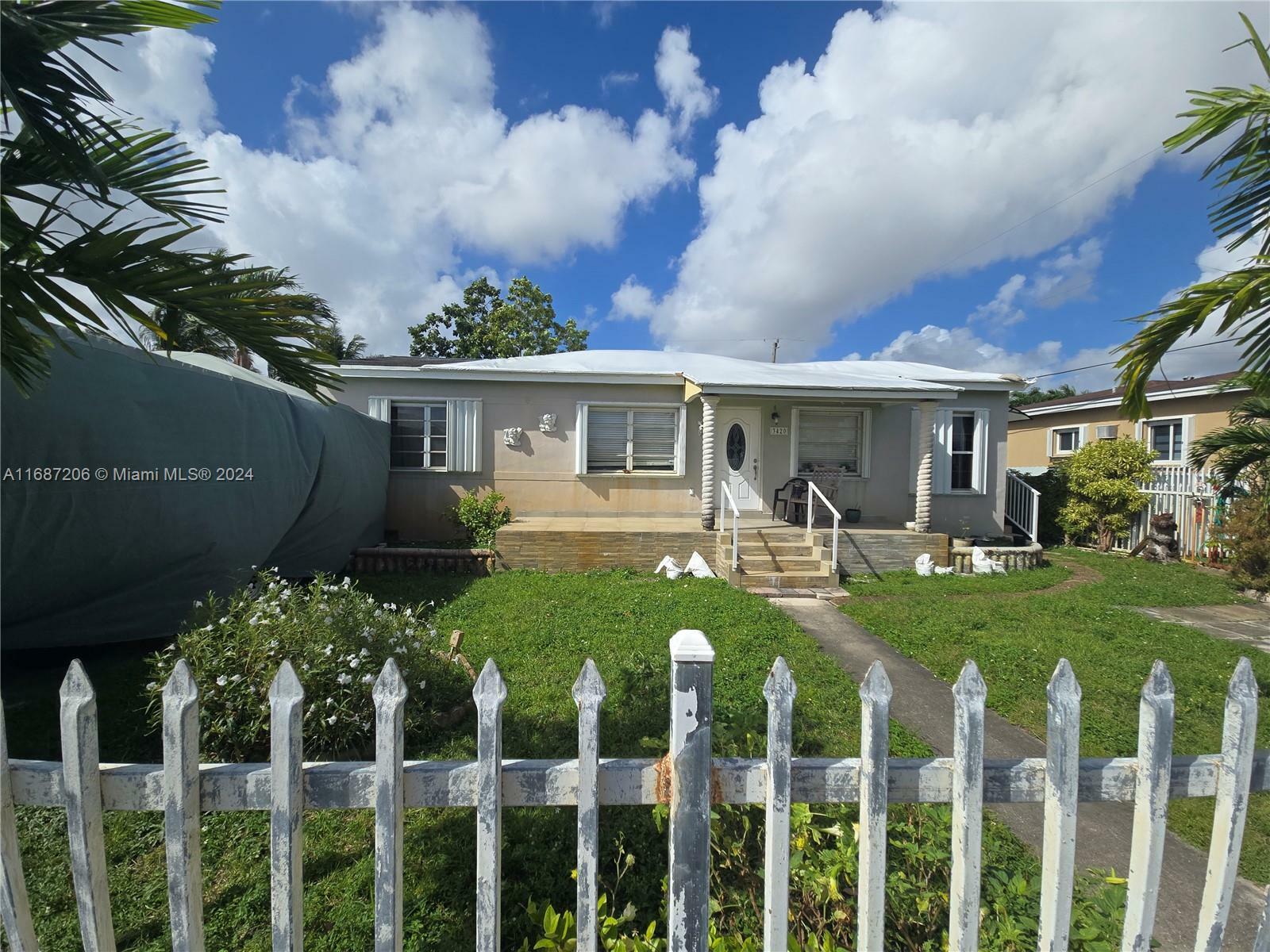 Property Photo:  3420 E Palm Ct  FL 33013 