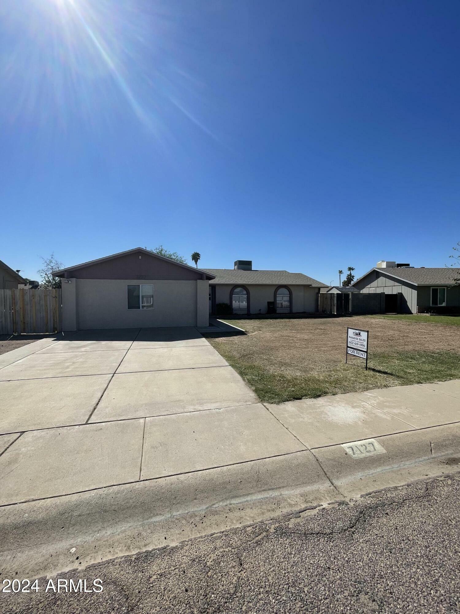 Property Photo:  7127 W Vogel Avenue  AZ 85345 