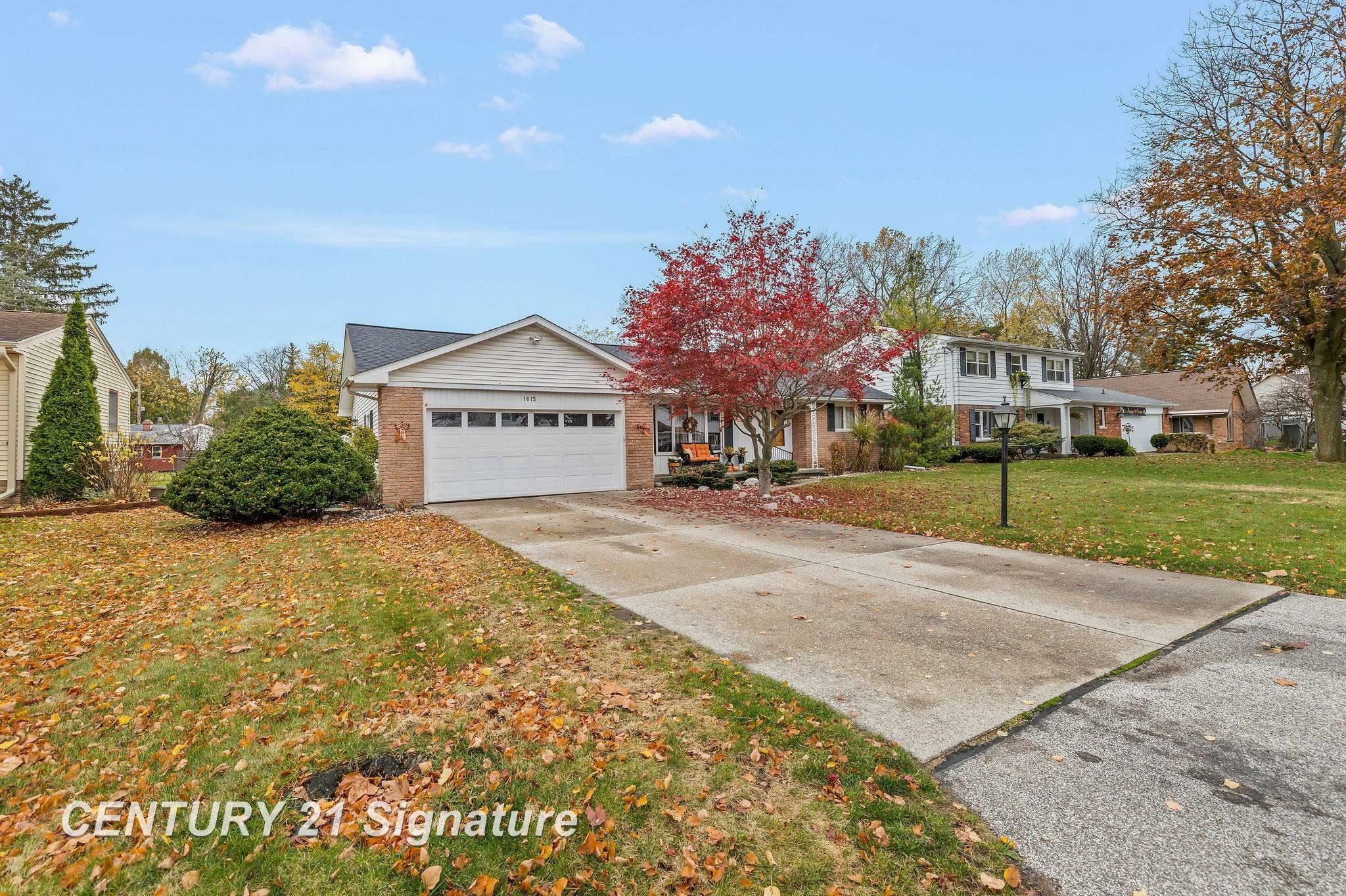 Property Photo:  1615 Vancouver Drive  MI 48638 