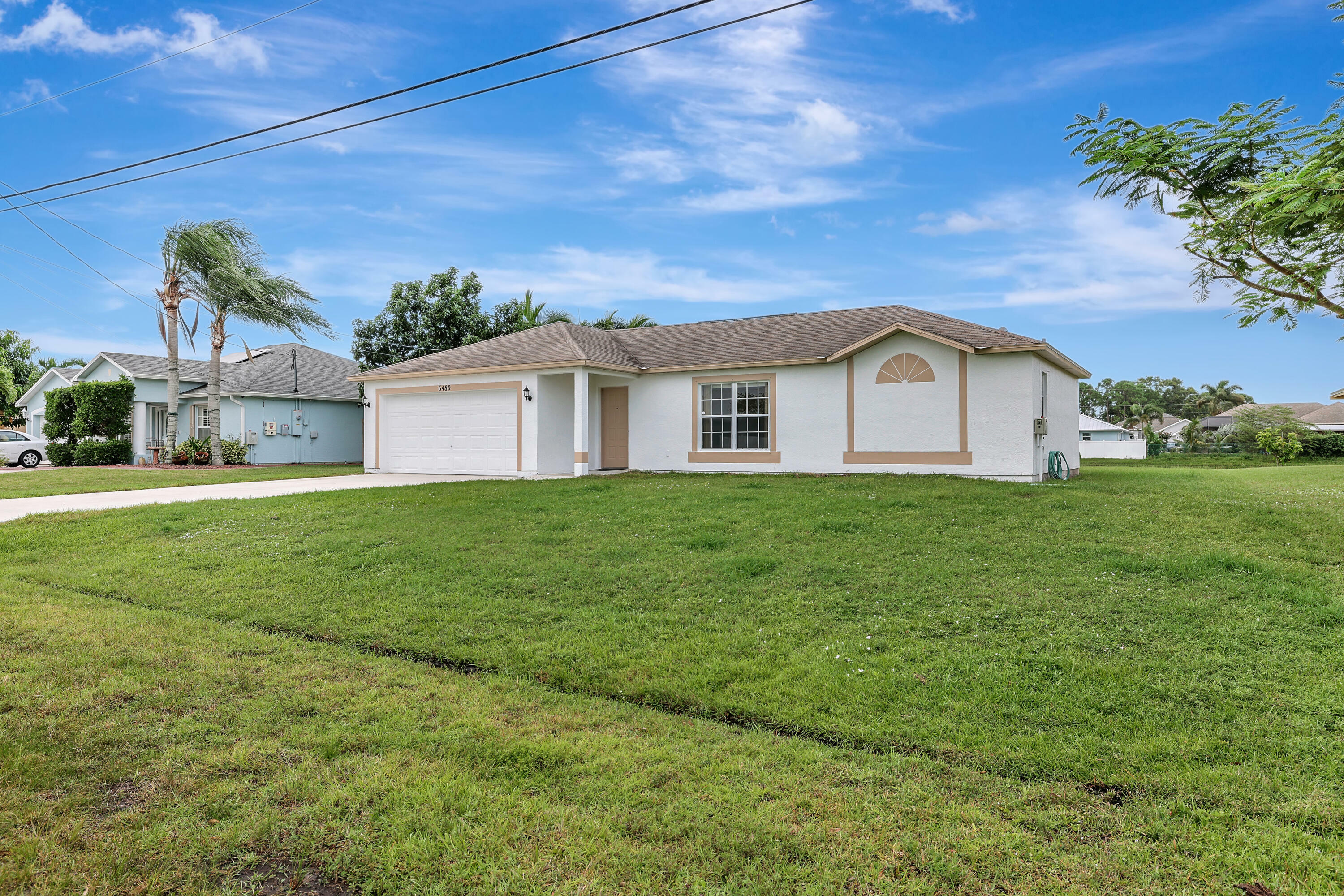 Property Photo:  6480 NW Volucia Drive  FL 34986 