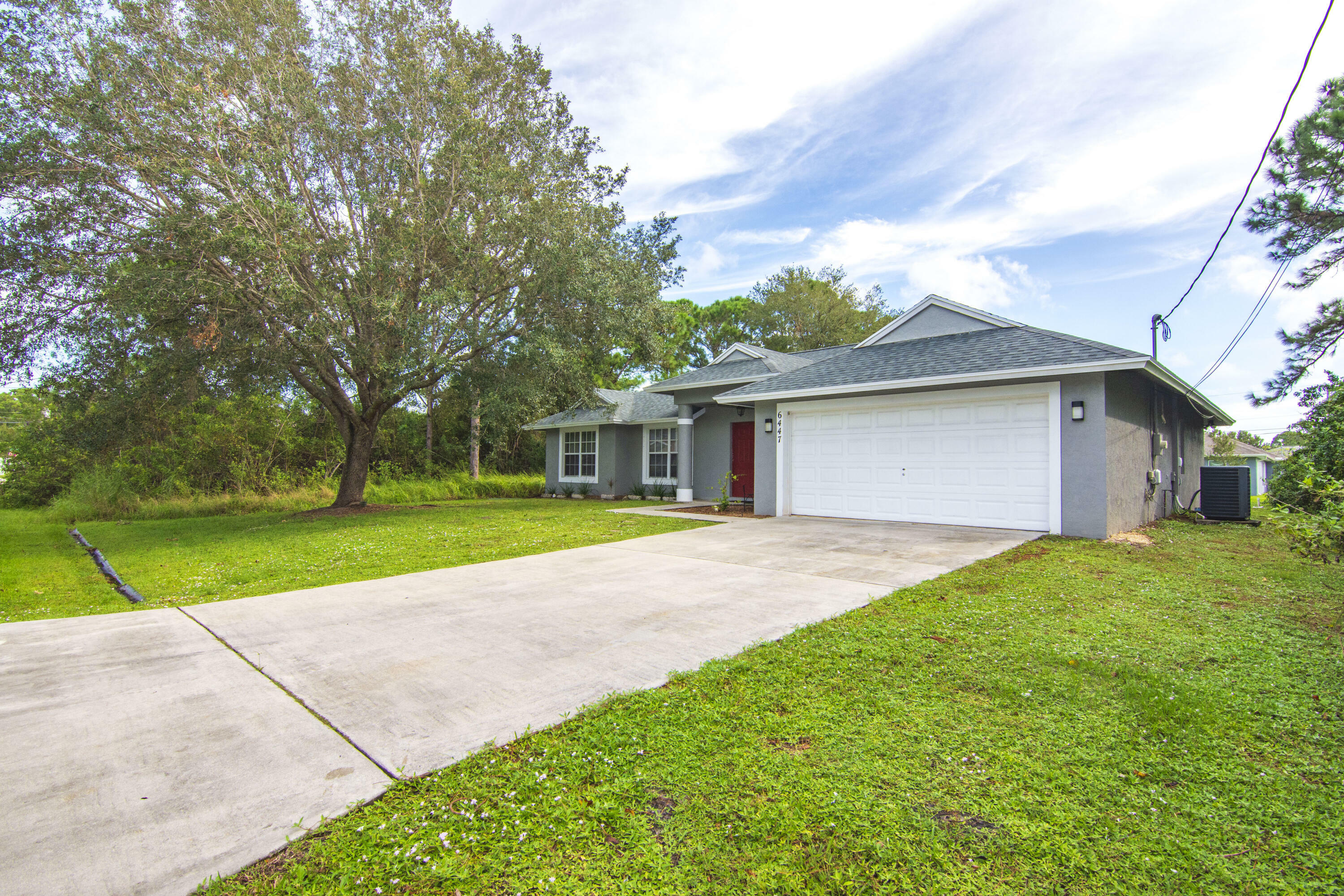 Property Photo:  6447 NW Foxglove Street  FL 34986 