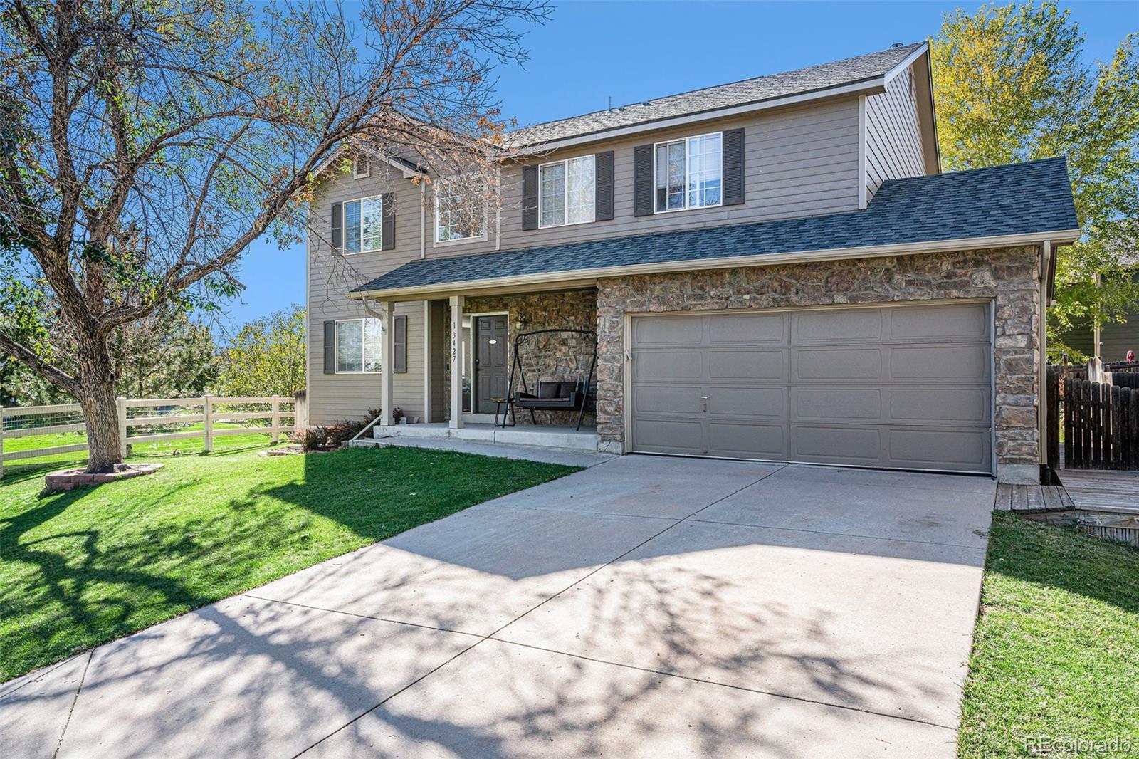 Property Photo: 13427 Dexter Way CO 80241