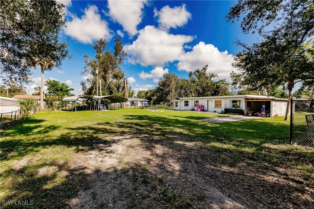 Property Photo:  716 Pondella Road  FL 33903 