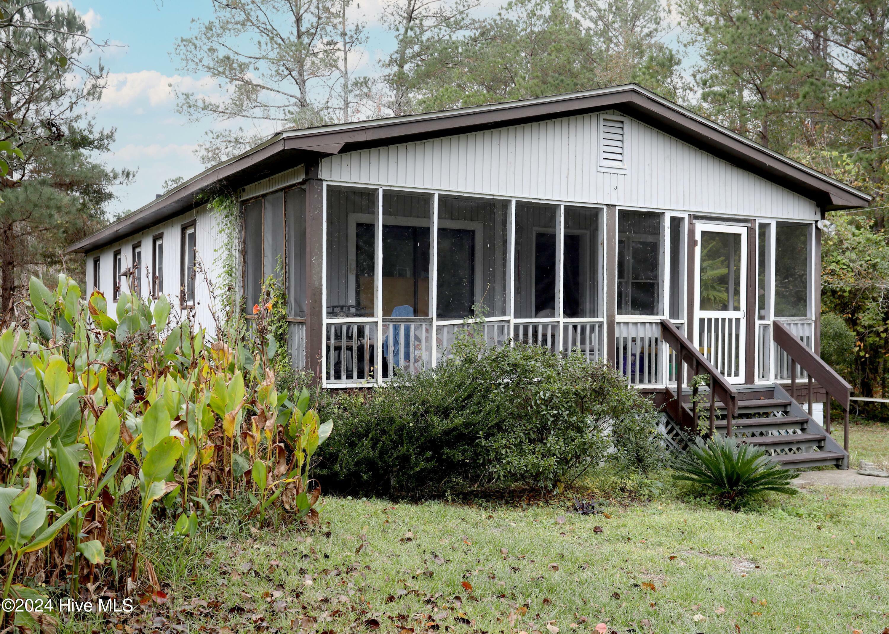 Property Photo: 408 Old Folkstone Road NC 28445
