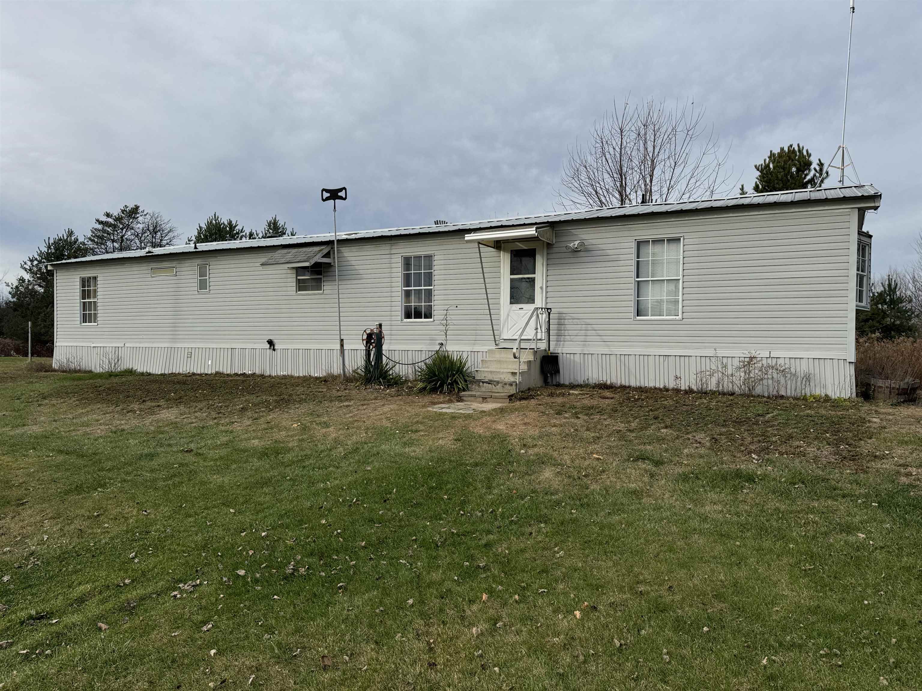 Property Photo:  4122 Rhodes Road  MI 48652 