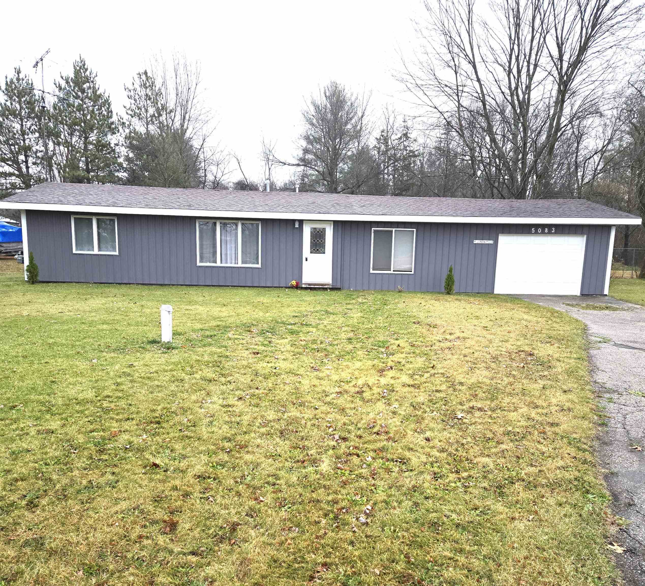 Property Photo:  5083 S Dundas Road  MI 48612 