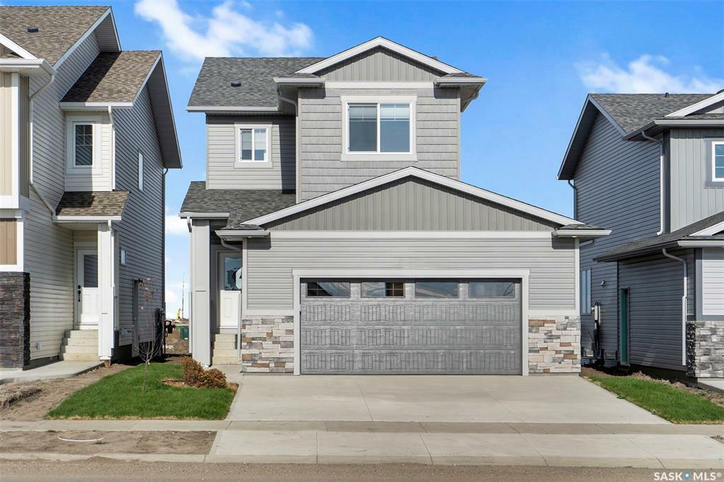 Property Photo:  118 Kostiuk Crescent  SK S7V 1R8 