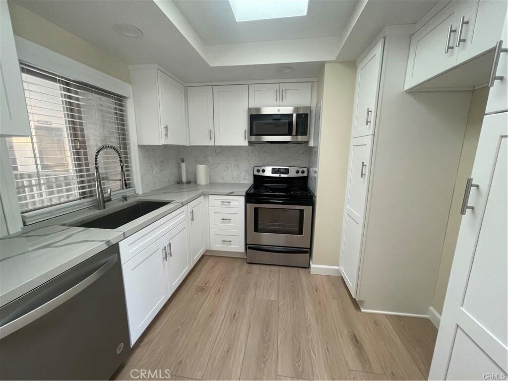 Property Photo:  8566 Van Ness Court 24H  CA 92646 