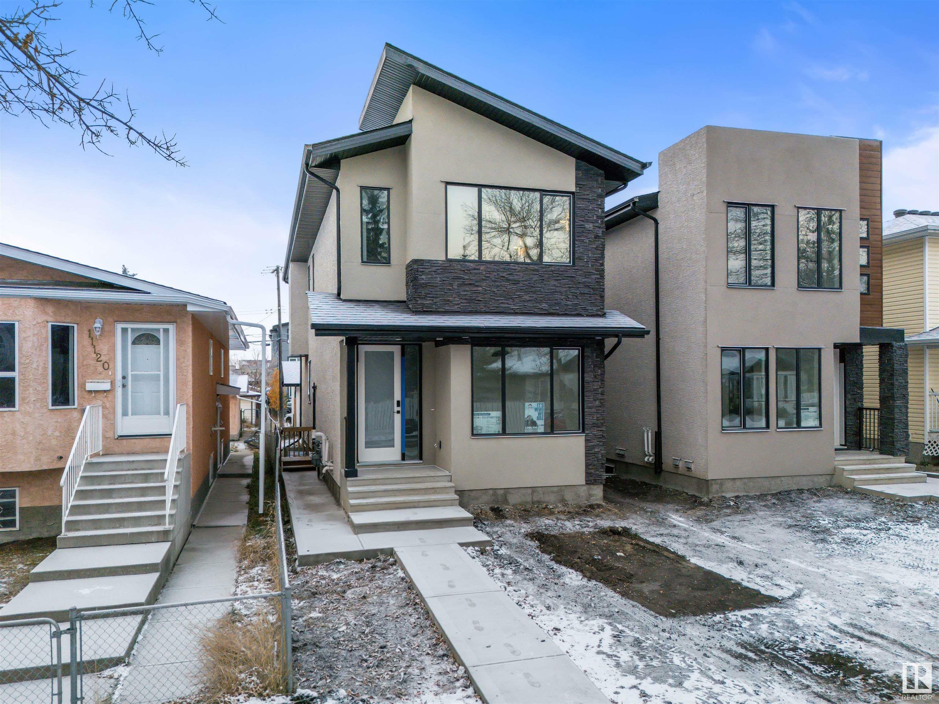 Property Photo:  11124 132 Street NW  AB T5M 1E5 