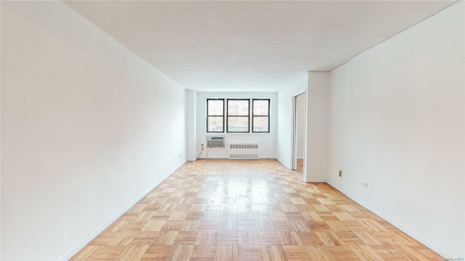 Property Photo:  84-09 155th Avenue 1H  NY 11414 