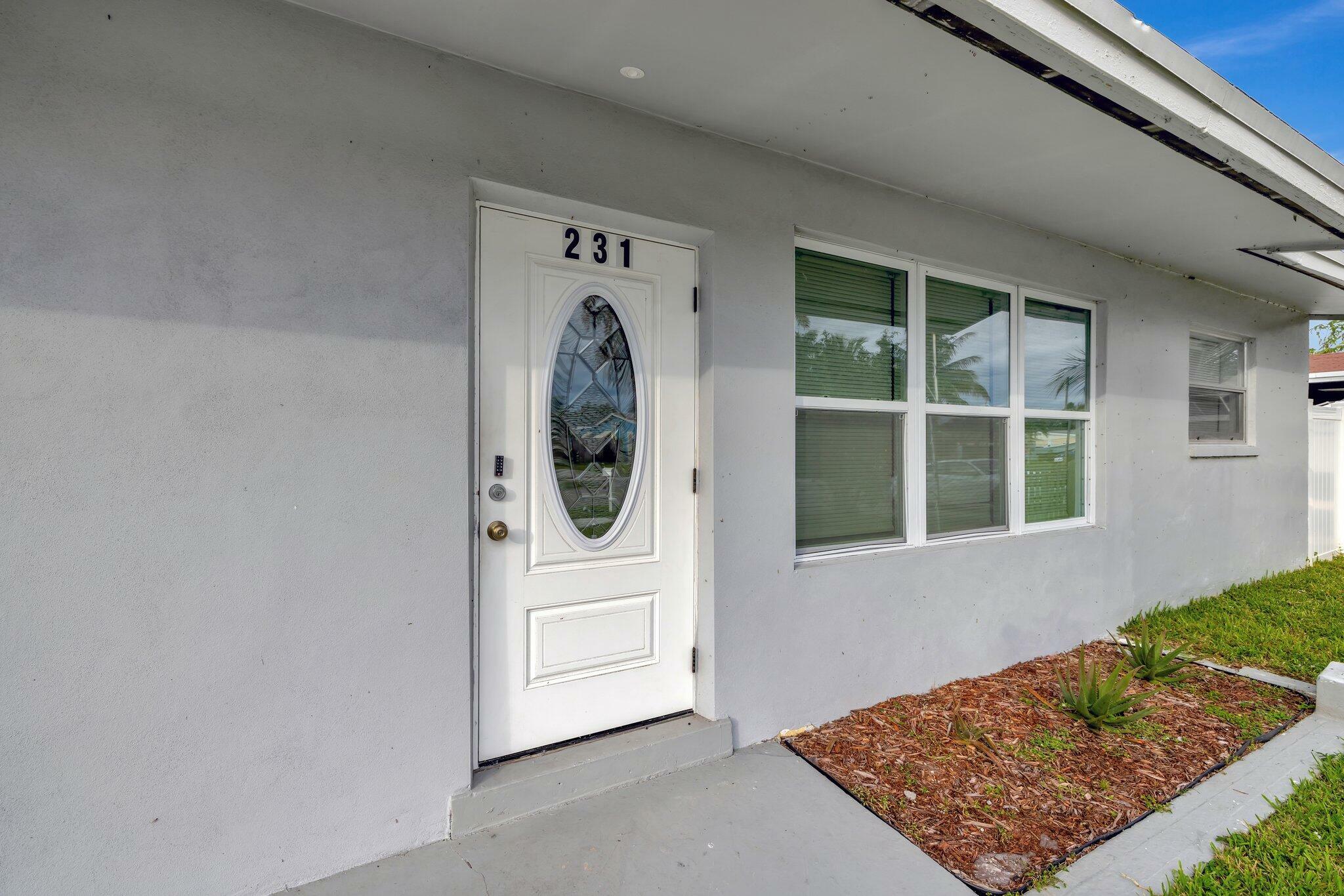 Property Photo:  231 NW 21st Street  FL 33060 