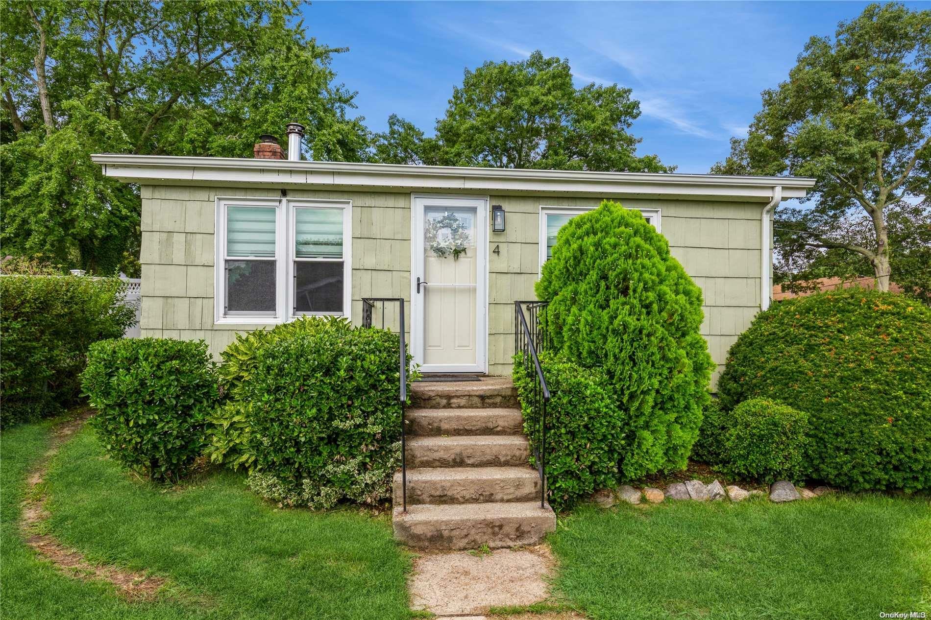 Property Photo: 4 W Shore Drive NY 11772