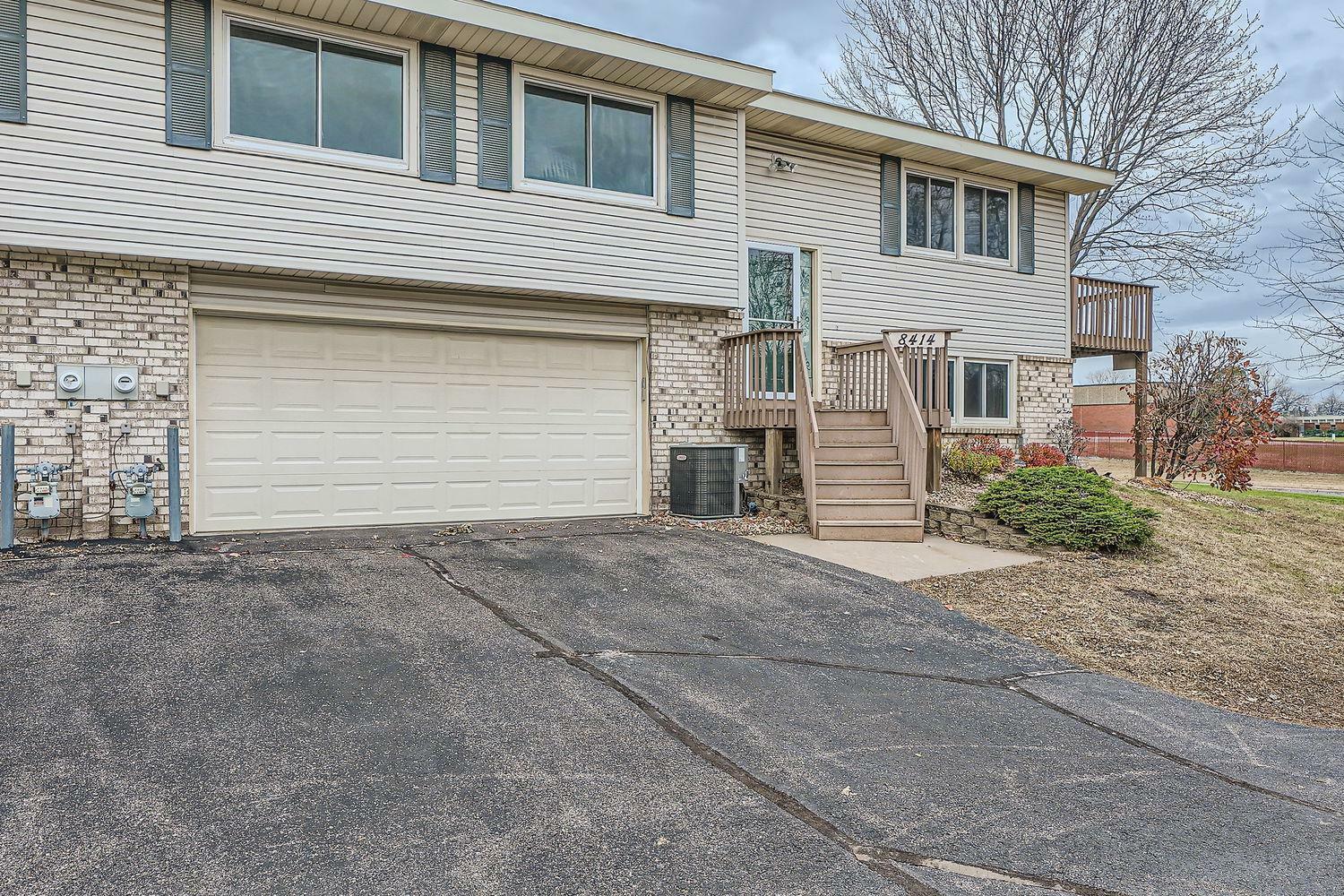 Property Photo:  8414 Yates Avenue N  MN 55443 