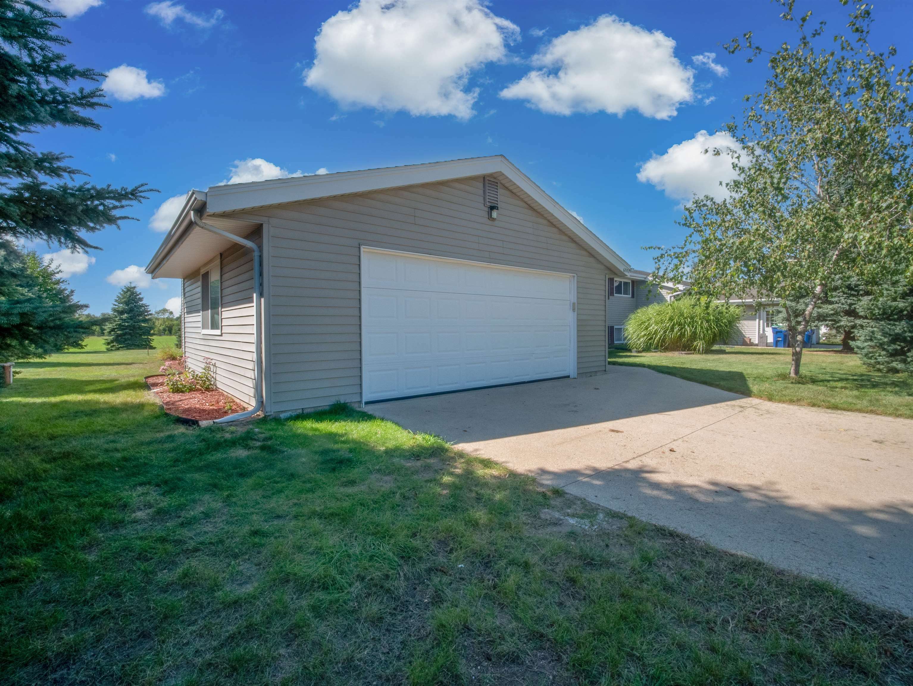 Property Photo:  6987 Eastwood Trail  WI 53090 