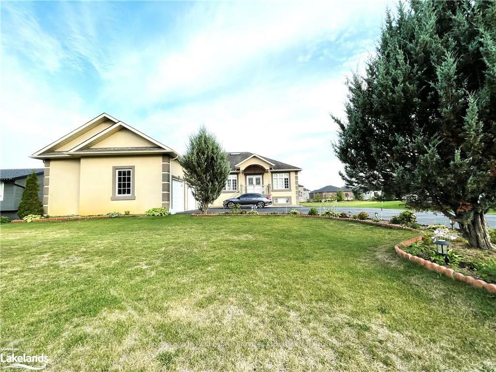 Property Photo: 16 Wasaga Sands Drive ON L9Z 1J6