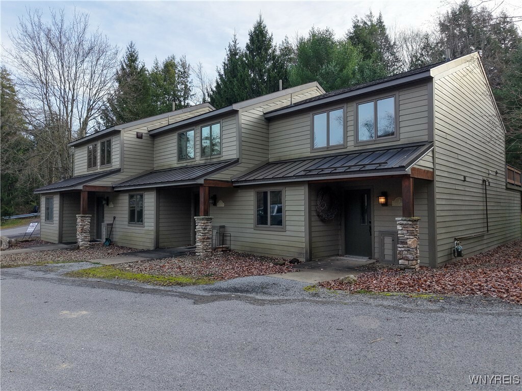 Property Photo:  3 Creekside Village  NY 14731 