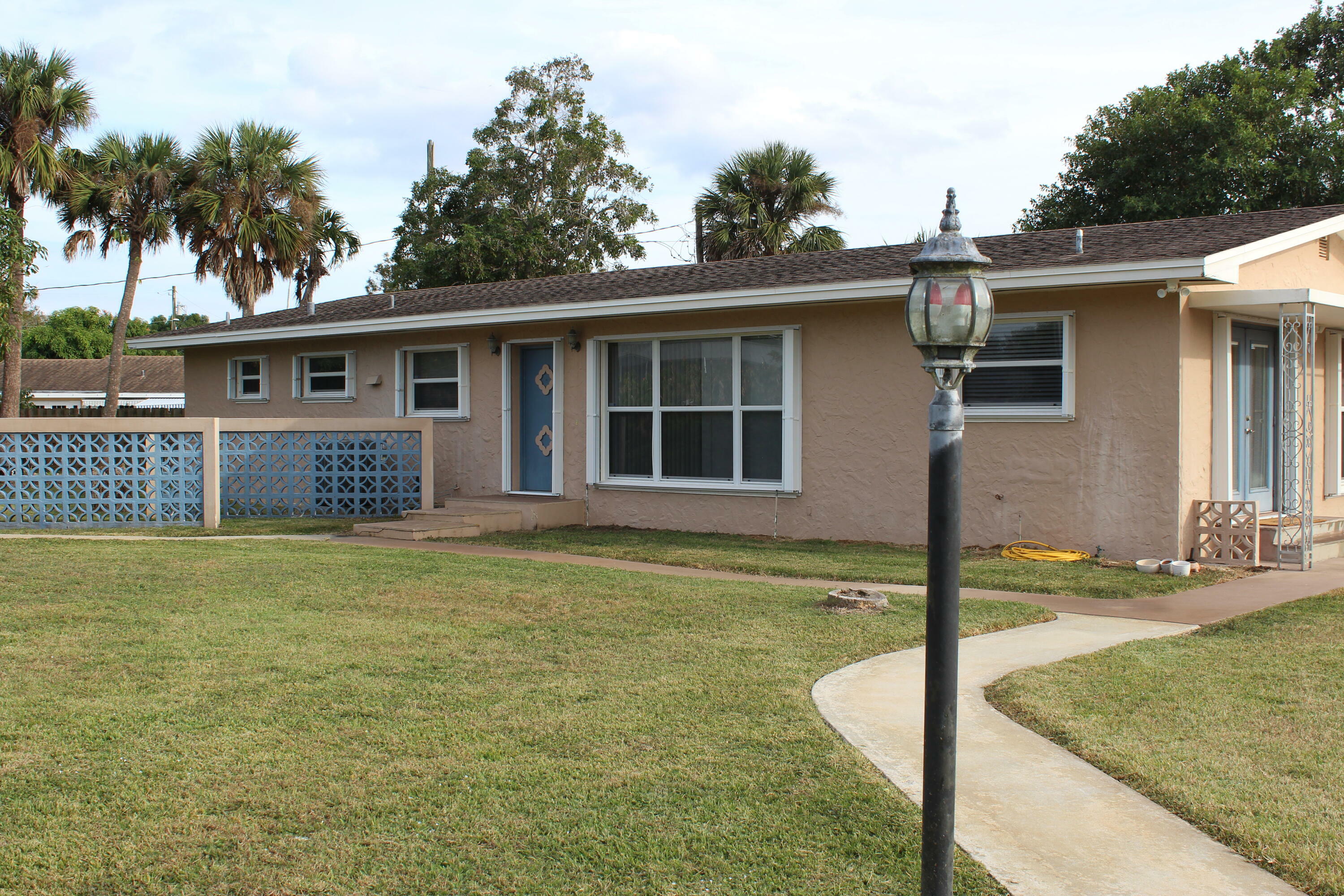 Property Photo:  716 Poinsetta  FL 33440 