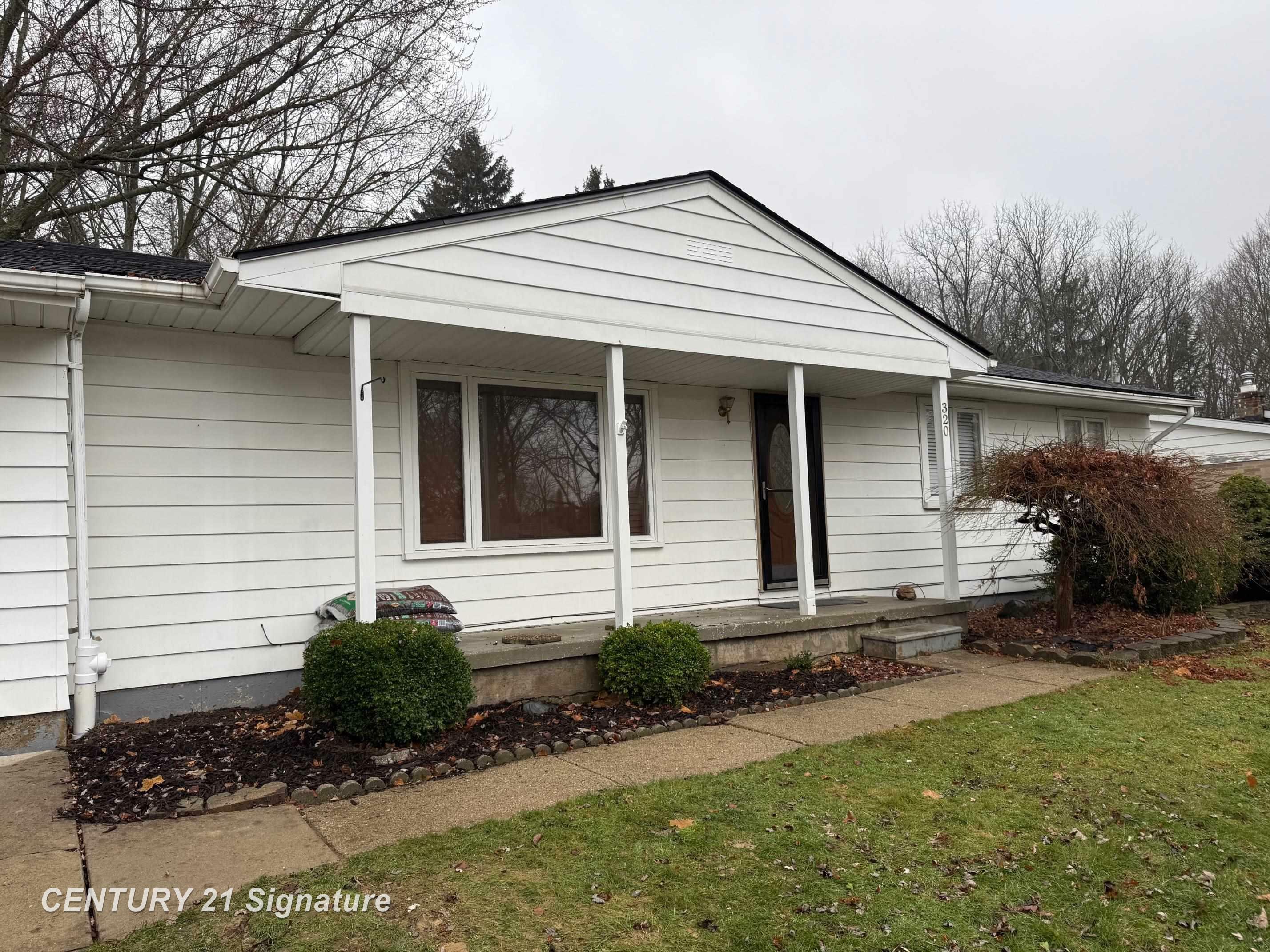 Property Photo:  320 Holland Road  MI 48433 