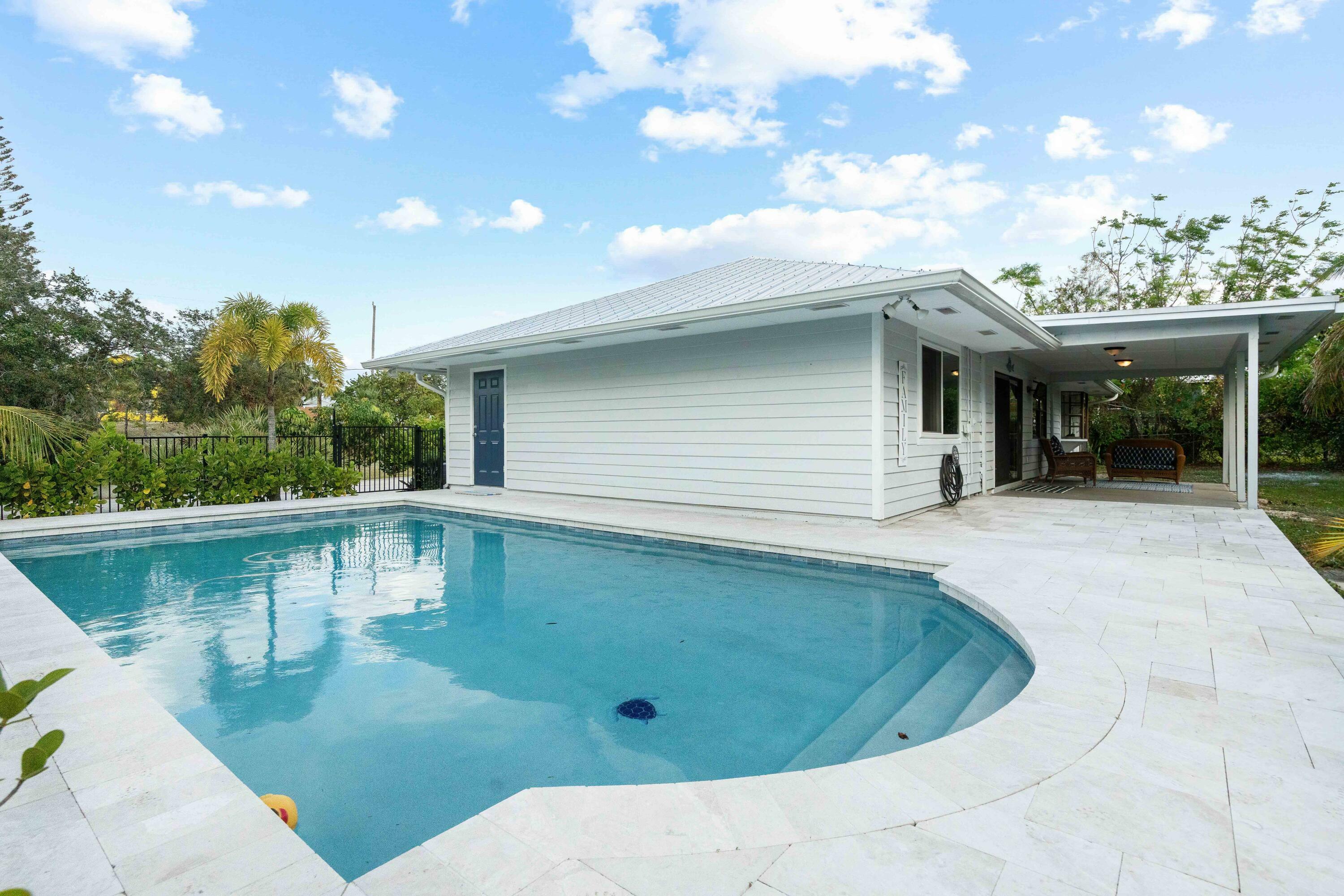 Property Photo:  9292 SE Duncan Street  FL 33455 